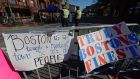 Signs at a makeshift memorial  for victims of the Boston Marathon bombings, near the marathon finish line. Photograph: Kevork Djansezian/Getty Images