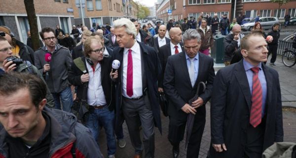 The leader of the Dutch far-right Party for Freedom Geert Wilders speaks to the press during his visit to the Schilderswijk district in The Hague.  Photograph: Martijn Beekman/AFP/Getty Images