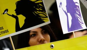 A member of Amnesty International at a demonstration outside the El Salvador embassy in Mexico City in support of a 22-year-old Salvadoran woman identified as Beatriz, who is seeking an abortion. Photograph: Reuters/Henry Romero