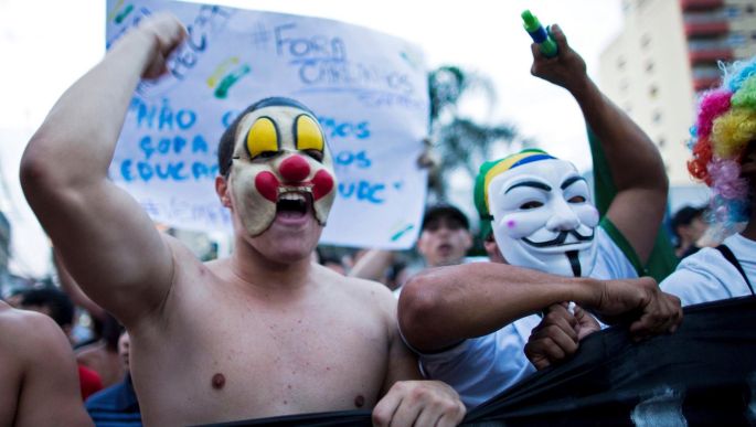 Demonstrators participate in an anti-government protest in Sao Jose dos Campos. Massive protests in Brazil haved tapped into widespread anger at poor public services, police violence and government corruption. Photograph: Roosevelt Cassio/Reuters