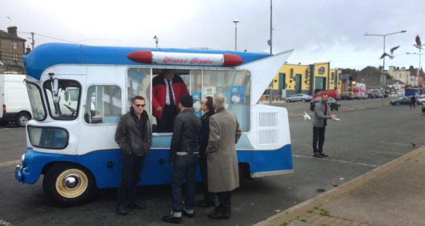   U2 queues for ice-cream on Bray seafront. Photograph: Jason Forde