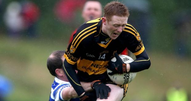 Dr Crokes’ Colm Cooper is tackled by  Dan Hegarty of Castlehaven. Photograph: Ryan Byrne/Inpho