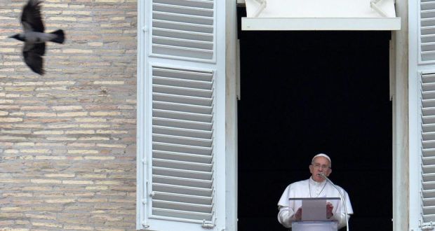 Pope Francis addresses the faithful as a pigeon flies by during the Angelus prayer at Saint Peter's Square in the Vatican on Sunday. The Vatican has refused to provide a United Nations rights panel with information on the Church's internal investigations into the sexual abuse of children by clergy, saying that its policy was to keep such cases confidential. Photograph: Ettore Ferrari/EPA