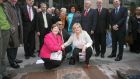 File image from June 2008   of (foreground, left to right) Dublin's then deputy lord mayor Anne Carter, Dr Kader Asmal and former Dunnes worker Mary Manning, kneeling next to a plaque commemorating a group of supermarket workers who staged a two-and-a-half year anti-apartheid strike in the 1980s, as it was unveiled in central Dublin. Photograph: Niall Carson/PA Wire 
