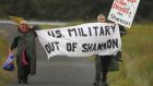 Struggle for peaceful means: Niall Farrell and Margaretta D’Arcy attempting to block the runway at Shannon in protest at the use of the airport by the US military. Photograph: Niall Carson/PA Wire