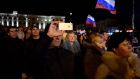 Crowds gathered in front of the Crimea’s parliament in Simferopol tonight to celebrate the annexation of Crimea to Russia. Photograph: Jakub Kaminski/EPA.