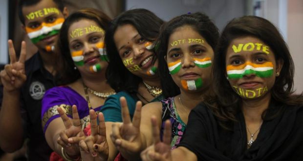 A group of people in Mumbai pose after getting their faces painted to encourage voting ahead of the sixth phase of India’s general election today. Photograph: Divyakant Solanki/EPA 