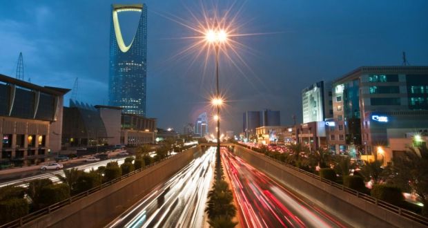 Vehicle light trails pass the Kingdom Tower on King Fahad Road in Riyadh, Saudi Arabia. The country’s market regulator said it will open the Arab world’s biggest bourse to international investors by the middle of 2015. Photograph: Waseem Obaidi/Bloomberg