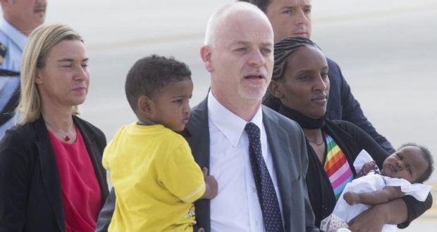 Meriam Yahia Ibrahim Ishag (3-R), from Sudan and her children, are welcomed by Italian minister for foreign affairs, Federica Mogherini (L) , Lapo Pistelli (C) and Italian prime Mmnister Matteo Renzi (R), after landing at Ciampino Airport on the outskirts of Rome. Photograph: Claudio Peri/EPA 