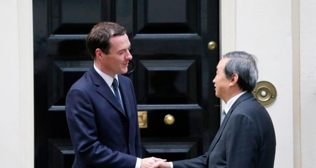 Britain’s chancellor of the Exchequer George Osborne greets China’s vice premier Ma Kai  outside 11 Downing Street in London. Photograph: Suzanne Plunkett/Reuters