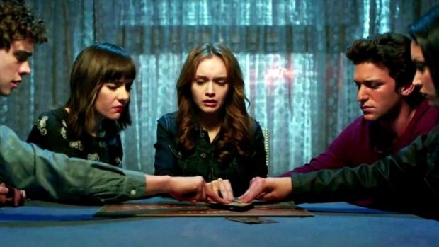 Teens spell trouble: Olivia Cooke (centre) in Ouija
