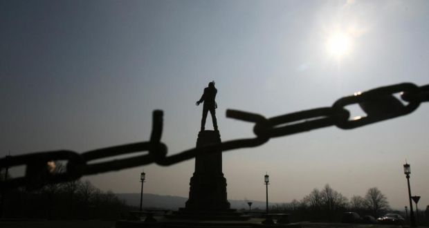 No compromise? The Stormont statue of unionist leader Sir Edward Carson, seen through a broken link, in Belfast. Photograph: Adrian Dennis/AFP/Getty Images