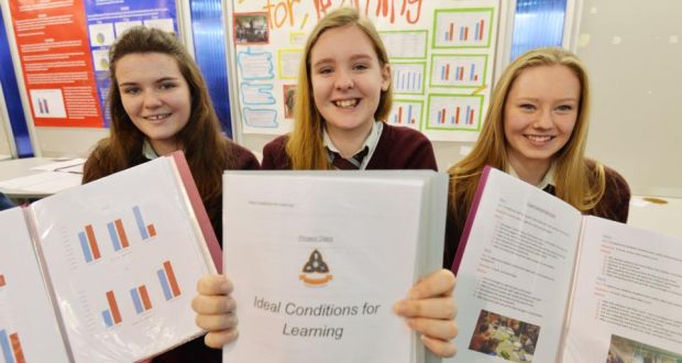 Students Eimear Delaney, Emily Ward and Aimee Finegan  have found that soft music without lyrics aids primary school learning. Photograph: Alan Betson/The Irish Times. 