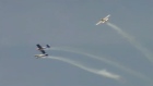 Two planes inches from disaster at air show