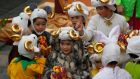 Young performers wearing goat hats take part in a Chinese New Year celebration at a shopping mall in Hong Kong on Monday. The Year of the Goat sees a Hong Kong more divided than ever on how to deal with mainland China. Photograph: Bobby Yip/Reuters
