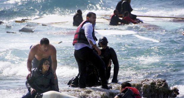 Migrants, who are trying to reach Greece, are rescued by members of the Greek Coast guard and locals near the coast of Rhodes. Photograph: Eurokinissi/Reuters 