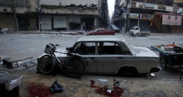 ‘On December 13th 2012, a news team from the US network NBC was kidnapped by armed men in northern Syria.’ Above,  the aftermath of an artillery mortar shell attack  in  Aleppo, on December 3rd, 2012.  Photograph:  Javier Manzano/AFP/Getty Images