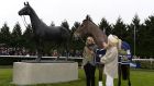 Kauto Star stands next to a statue of itself in the parade ring at Kempton Park racecourse last year. Photograph: Alan Crowhurst/Getty Images