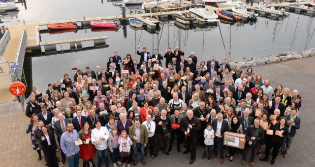 Finalists in the Blas na hÉireann awards gather at Dingle harbour with their products. Photograph: Don MacMonagle