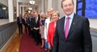 Taoiseach Enda Kenny stands in Government Buildings with members of the new Cabinet. Photograph: Merrion Street