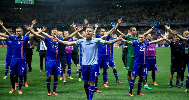 Iceland’s Aron Gunnarsson leads the celebrations on the pitch at Stade de Nice after beating England on Monday night. Photograph: PA