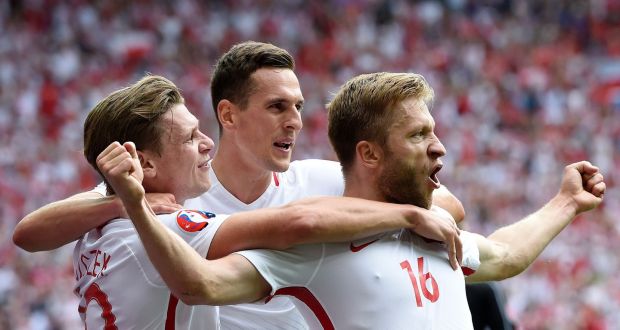 Poland’s Jakub Blaszczykowski celebrates opening the scoring against Switzerland in the last 16 of the competition.Photograph: Philippe Desmazes/AFP/Getty Images