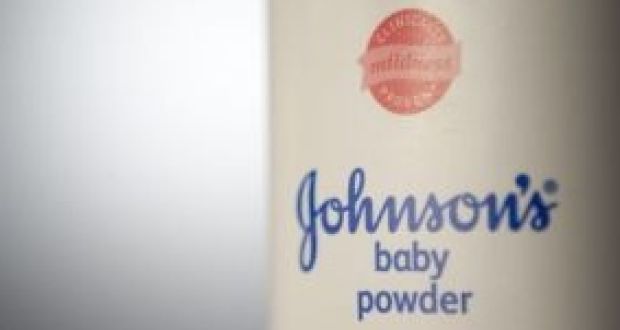 Johnson & Johnson shares hit a record high of $125.75, before edging back fractionally.