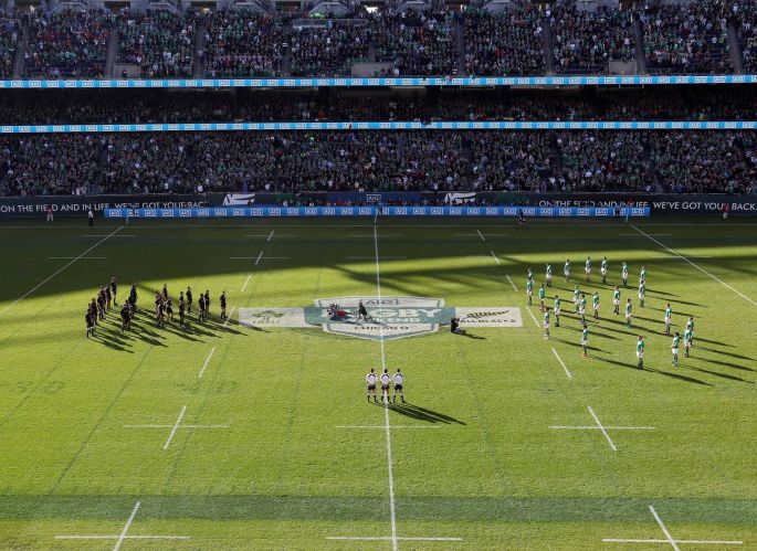 Ireland face the Haka in a shape of eight in memory of Anthony Foley of Munster. Photo: Billy Stickland/Inpho 
