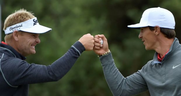 Thorbjorn Olesen and Soren Kjeldsen celebrate making a birdie during the final round of the World Cup of Golf on the Kingston Heath course in Melbourne. Photograph: Getty Images