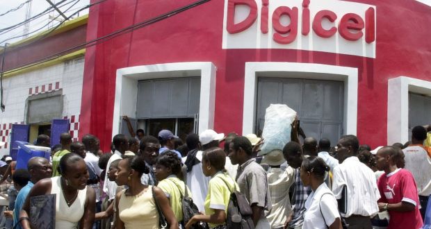 Digicel’s office in Port-au-Prince, Haiti. The company’s restructuring will  involve cutting one in four jobs and  signing a new partnership with a Chinese group, ZTE. Photograph: Thony Belizaire/AFP/Getty Images 