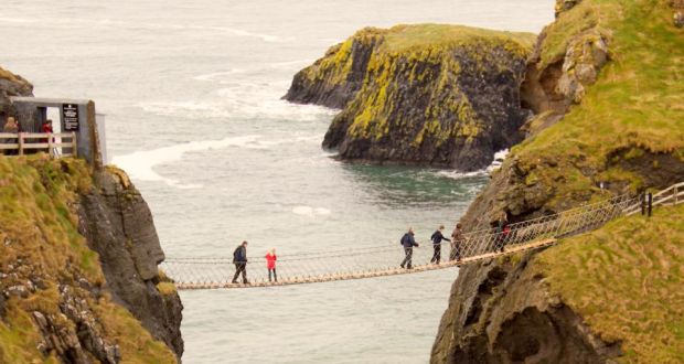 Swinging in the wind: Carrick-a-Rede rope bridge in Co Antrim. Photograph: iStock