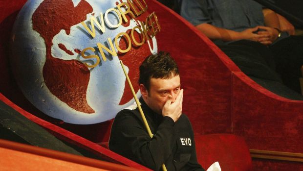 Jimmy White looks dejected during his first round defeat to Barry Pinches during the 2004 World Championships. Photograph: Alex Livesey/Getty