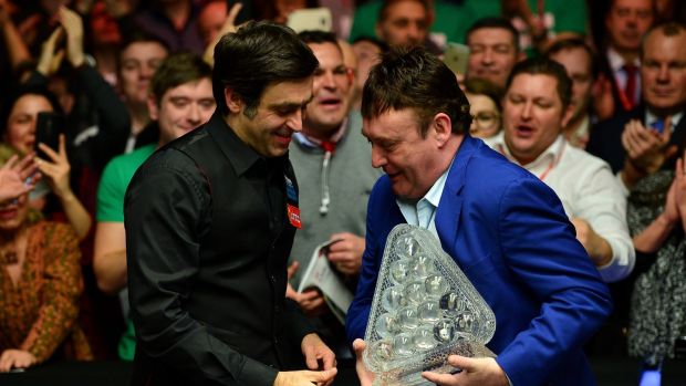Jimmy White presents the Masters trophy to Ronnie O’Sullivan in 2016. Photograph: Dan Mullan/Getty