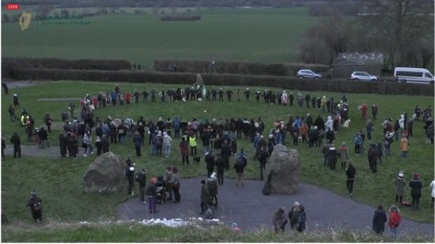 Despite the dull day, crowds gathered outside the Neolithic passage tomb in Co Meath to celebrate the rising sun of the winter solstice. Photograph: Heritage Ireland