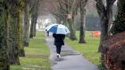 A walker in the rain in Swords, Dublin on Wednesday. Photograph: Colin Keegan/Collins