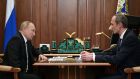 Russian president Vladimir Putin and deputy prime minister  Dmitry Grigorenko at the Kremlin in Moscow on Monday. Photograph: Mikhail Klimentyev/Sputnik/AFP via Getty Images