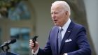 US president Joe Biden holds a 9mm pistol built from a  kit: ‘Is it extreme to protect police officers, our children or to keep guns out of the hands of people who could not pass a background check?’ Photograph: Mandel Ngan/AFP