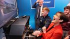 Minister for Education Norma Foley  joined students at Dublin City University on Wednesday to launch the ‘Mobile Newton Room’, a Stem classroom which features professional flight simulators. Photograph: Dara Mac Dónaill