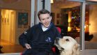 Tom Clonan’s son Eoghan with his  assistance dog Leahy. Photograph: Nick Bradshaw