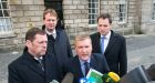 The Fianna Fail negotiating team of Barry Cowan, Jim O&rsquo;Callaghan, Michael McGrath, Charlie McConalogue outside Trinity College Dublin Friday evening after talks with Fine Gael on forming a government concluded. Photograph: Dave Meehan/The Irish Times
