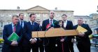Leader Miche&aacute;l Martin with Fianna F&aacute;il TD&rsquo;s Micheal McGrath, Jim O&rsquo;Callaghan, Dara Calleary, Fiona O&rsquo;Loughlin, Charlie McConalogue and Eugene Murphy speaking to media at Leinster House. Photgraph: Aidan Crawley