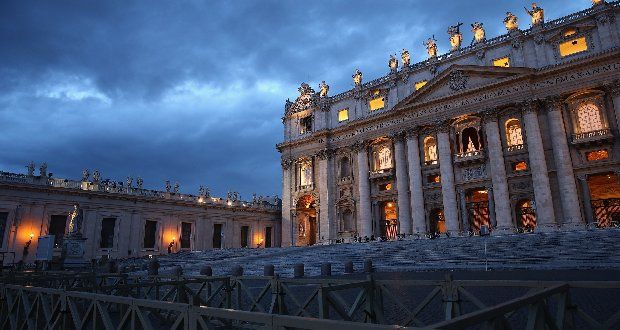 The sun sets behind St Peter's Basilica in St Peter's Square in the Vatican this evening. Cardinals are set to enter the conclave to elect a successor to Pope Benedict XVI tomorrow. Photograph: Dan Kitwood/Getty Images.