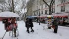 The snow-covered Place du Tertre, a square at the Butte Montmartre area in Paris yesterday as snow and freezing temperatures returned to northern France. Photograph: Reuters