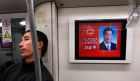A subway in Shanghai yesterday where a TV  screen shows   China's newly elected president  Xi Jinping. Photograph: Carlos Barria/Reuters