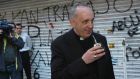 Man of the people: Cardinal Bergoglio drinks mate, a traditional beverage, in Buenos Aires earlier this  month. Photograph: DyN/AP Photo