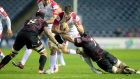 Edinburgh’s Ross Rennie and Netani Talei tackle Ulster’s Robbie Diack during last night’s RaboDirect Pro12 game at Murrayfield. Photograph: Graham Stuart/Inpho 