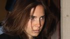 Amanda Knox is escorted to her appeal hearing at Perugia's Court of Appeal in Septembe 2011. Photograph:  Oli Scarff/Getty Images 