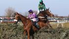 Mumbles Head with Jamie Moore (left) and Barry Geraghty’s Roberto Goldback refuse the last during Saturday’s Grand National. Photograph: Getty Images