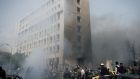 The damage left by a car bomb near the Syrian Central Bank in Damascus yesterday. Photograph:  New York Times 