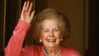 Margaret Thatcher waves from the front door of her home after returning from the Chelsea and Westminster Hospital following an operation on her broken arm on June 29, 2009 in London, England. Photograph: Oli Scarff/Getty Images